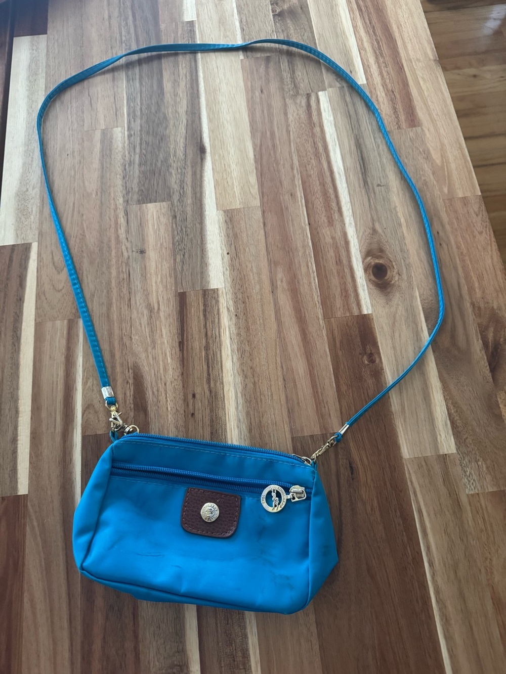 Longchamp Bright Blue Crossbody Bag with Gold Accent